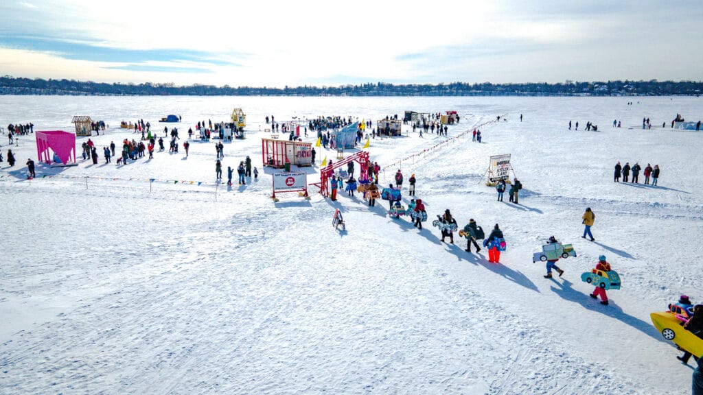 An aerial view of the shanty village on a frozen lake