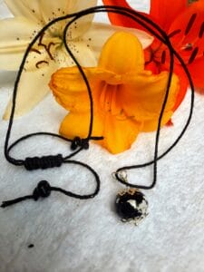 Black with foil on hemp - necklace
