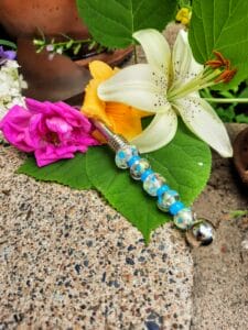 Clear with lime, blue, pinks, foil beads pie server