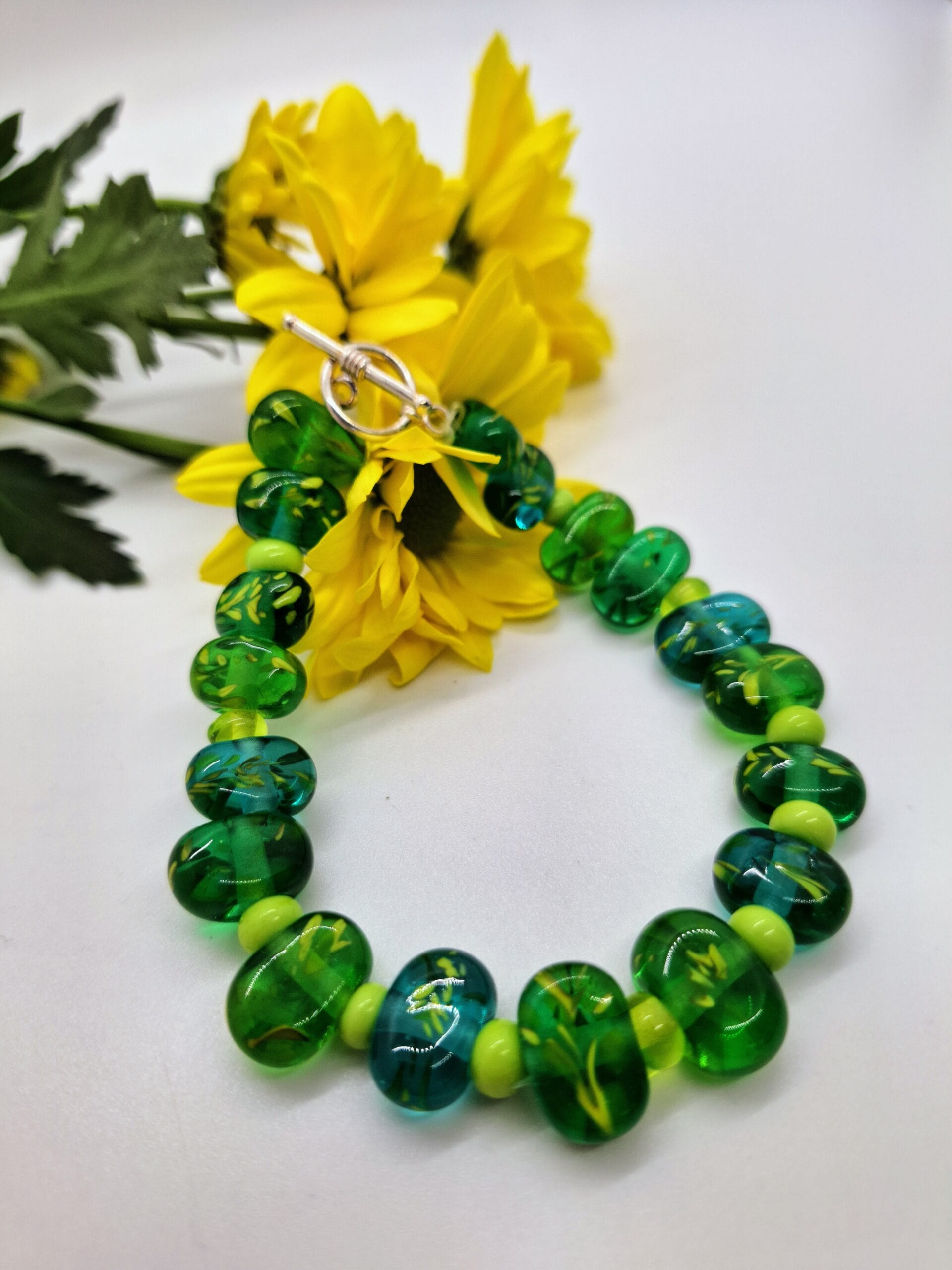 Dark greens feather flat bracelet