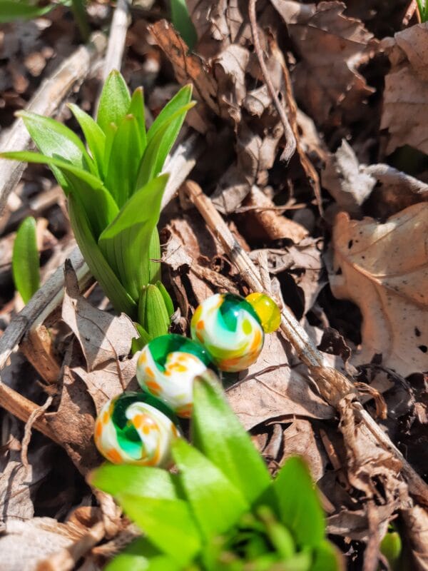 Emerald and yellow frit over white swirl 3 bead set