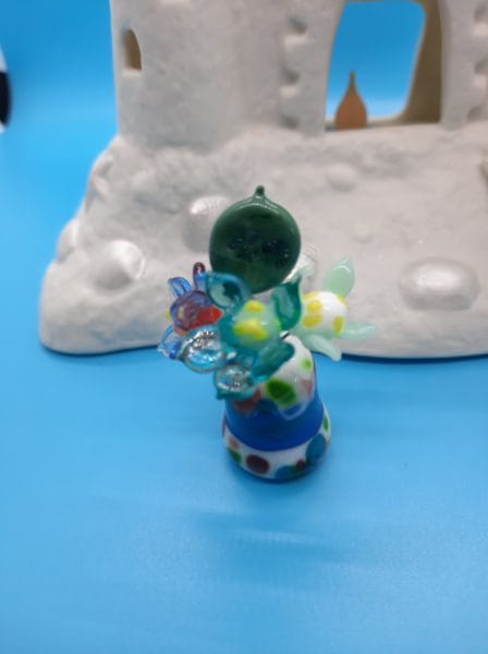 Garden view with transparent blue fairy vase