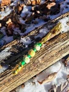 Ivory and emerald swirls on gold bracelet helper aka roach clip