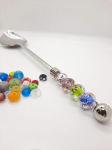 Lavender green and blue specks on large serving spoon