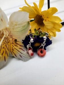 Coral swirl with red hearts in silver earrings