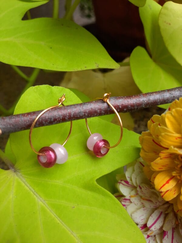 Pink small gold hoop dangly earrings