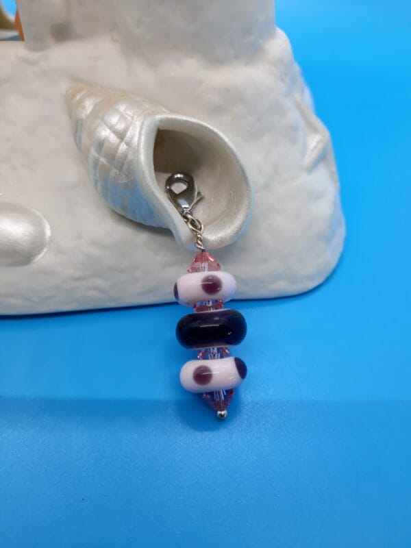 Purple polka dot zipper pull