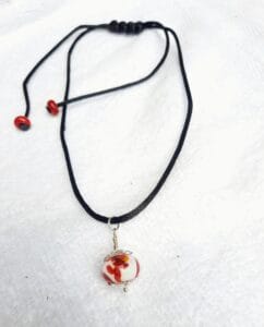 Red dragon on a silky cord necklace
