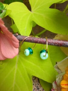 Teal and gulf greens small gold hoop dangly earrings
