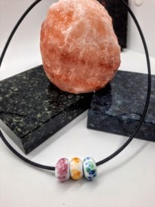 Tri color frit white beads on rubber necklace