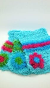 Turquoise green and pink dishcloths