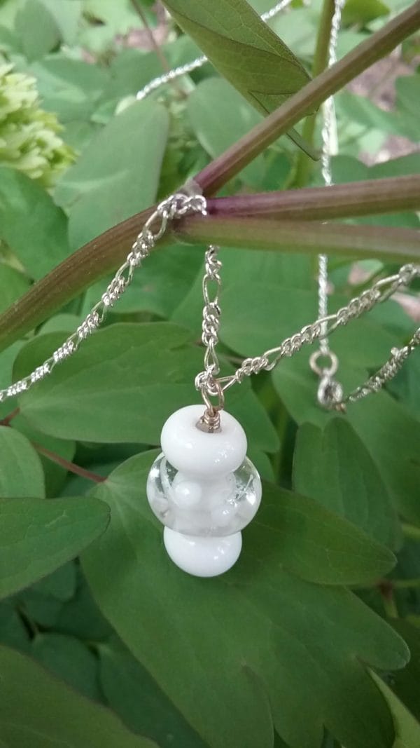 White glass beads on silver chain necklace